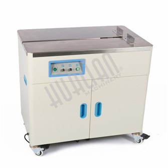 {{photo.Alt || photo.Description || 'Полуавтоматическая стрейпинг-машина (закрытый стол) KZB-10H'}}